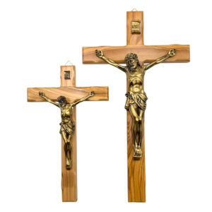 cruz pared bronce