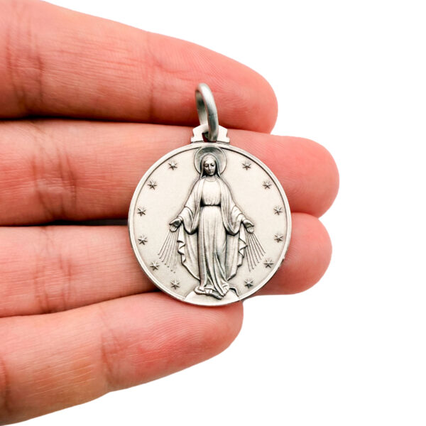 medalla grande plata milagrosa mano