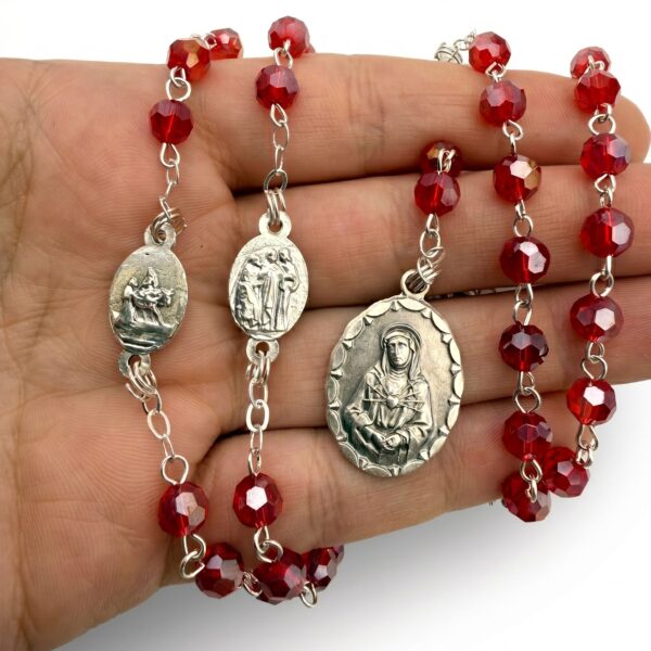 rosario siete dolores mano