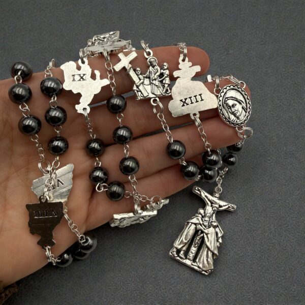 rosario via crucis mano